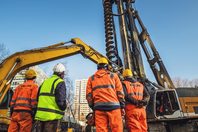 people, construction field, keller reflective vests